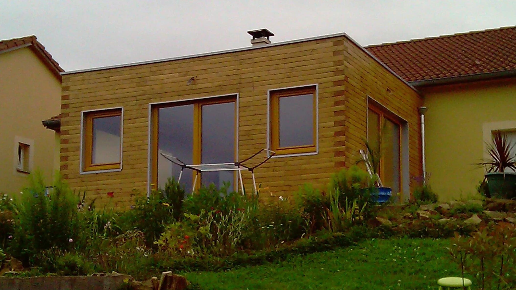 Extension de maison en parpaing bois massif PBM